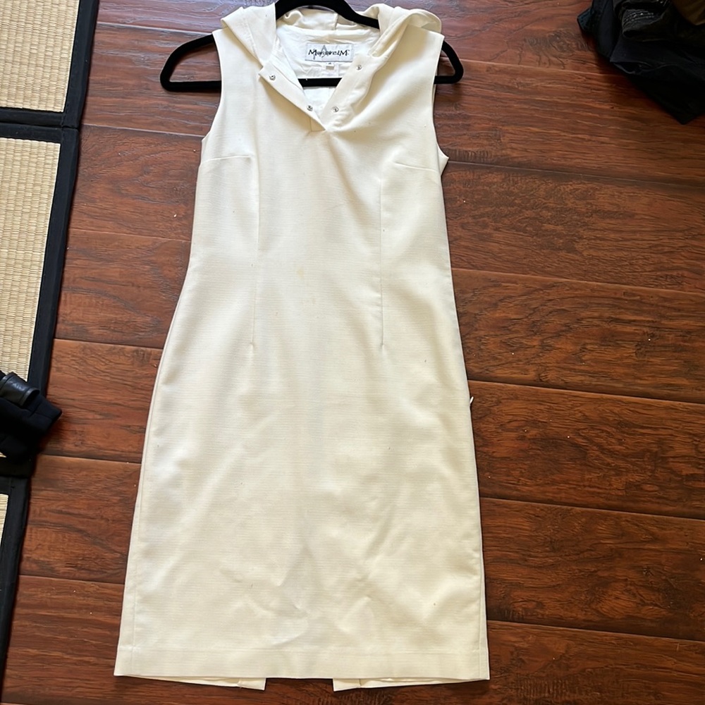 Designer Stylest dress with hood.